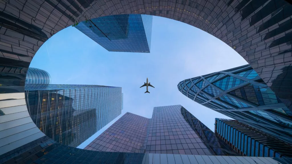airplane over La Defence in Paris